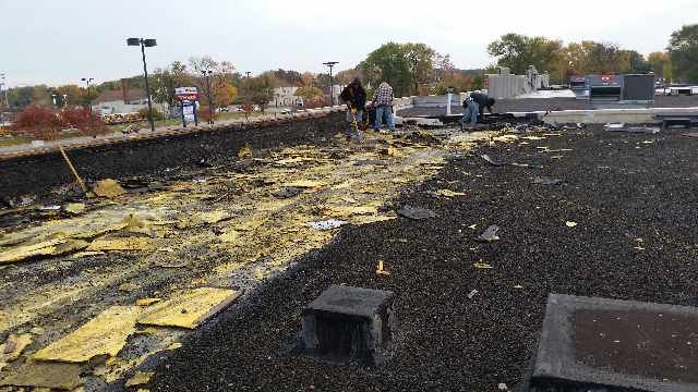 Roofing repair in progress 